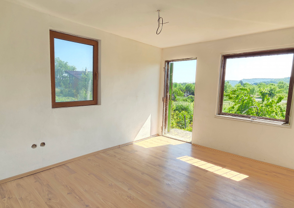 Rekreačný domček s pekným pozemkom v Harmónii. Odporúčam