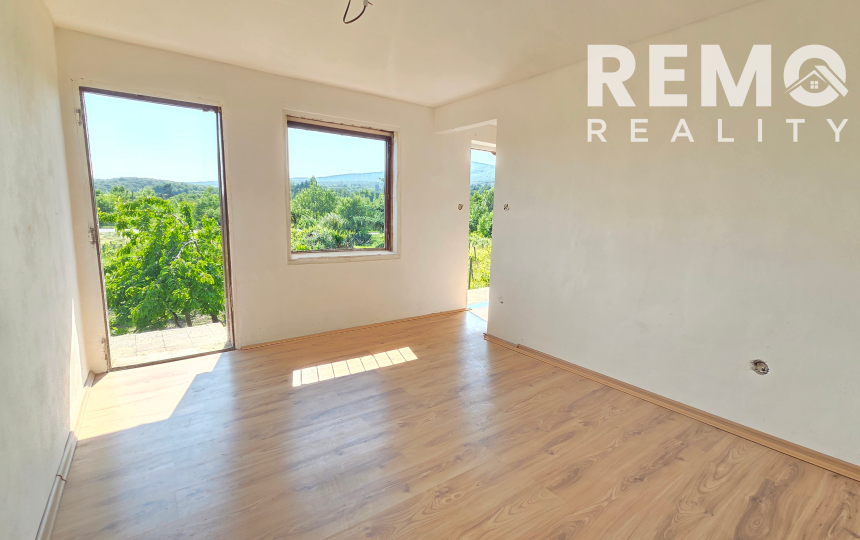 Rekreačný domček s pekným pozemkom v Harmónii. Odporúčam