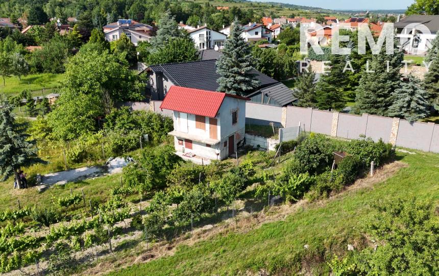 Rekreačný domček s pekným pozemkom v Harmónii. Odporúčam