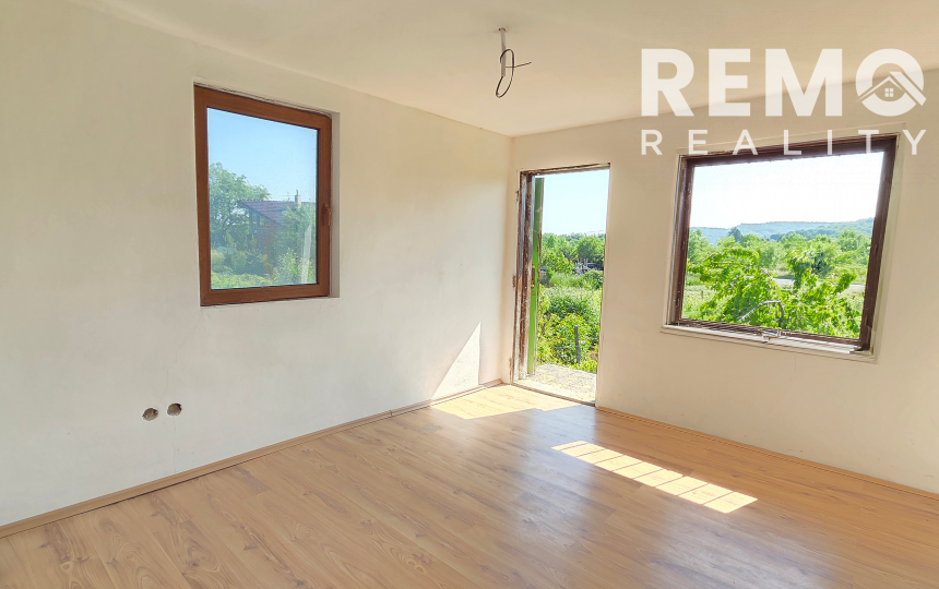 Rekreačný domček s pekným pozemkom v Harmónii. Odporúčam