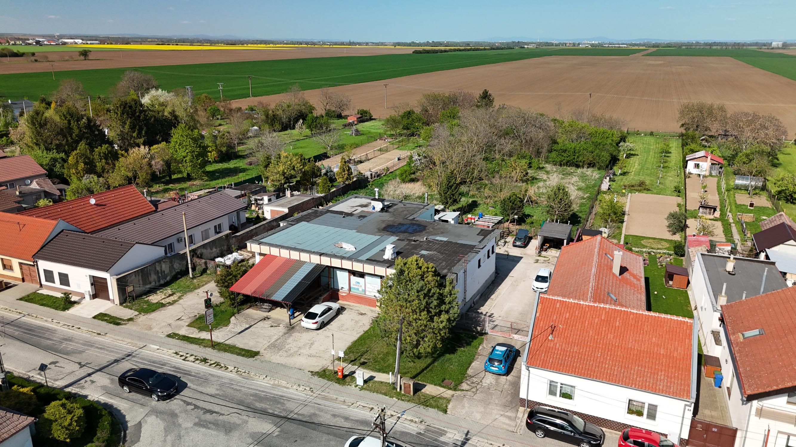 Komerčná budova s pozemkom 1 439 m² + 3-izb byt| IGRAM